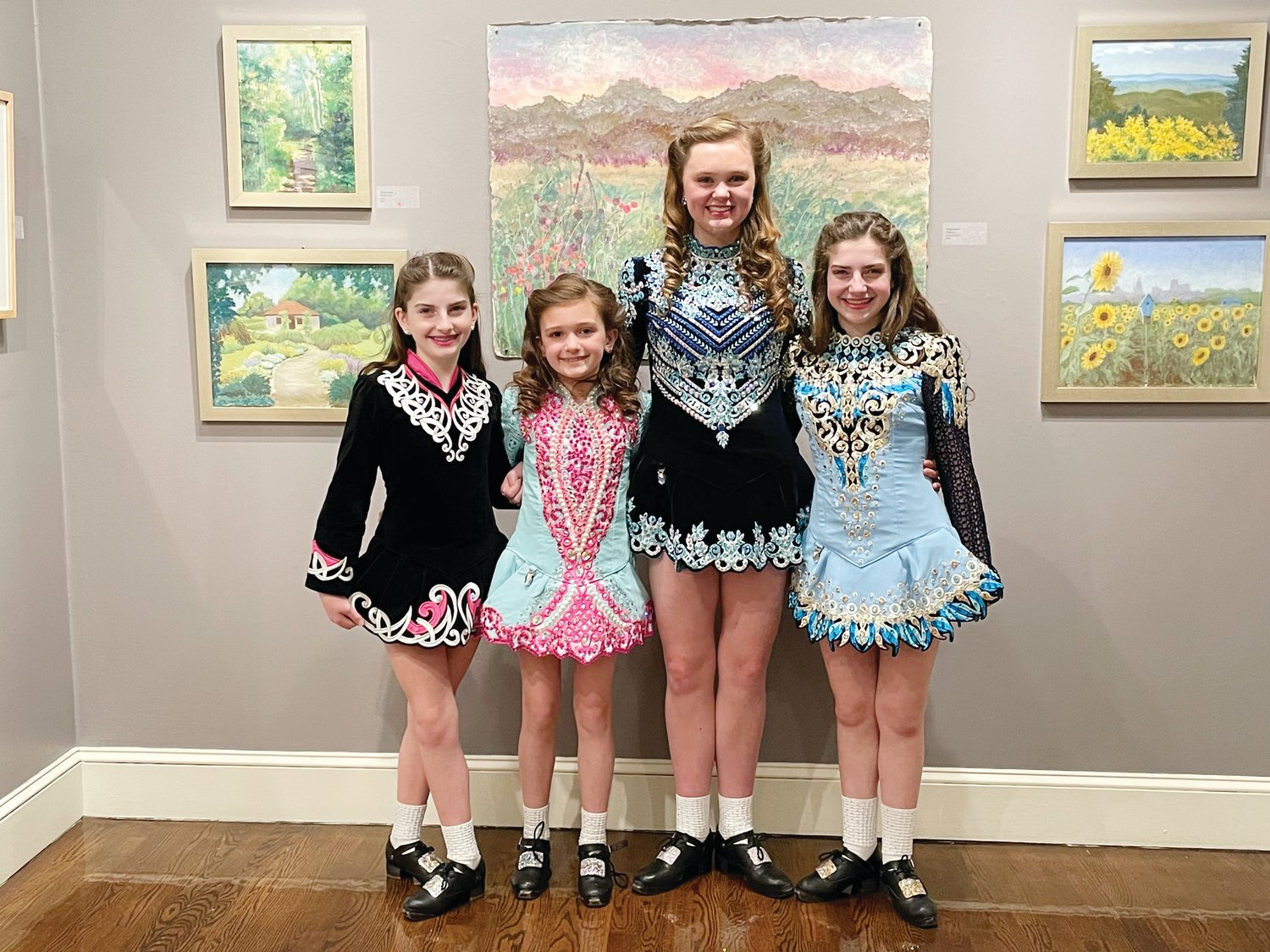 JUMPING BACK INTO PERFORMANCES: (From left to right) Moira Dadekian, Bridget Peterson, Maggie Peterson and Brigid Dadekian from the Kelly School of Irish Dance perform at the Providence Art Club this past February. This was their first in-person show since the start of the pandemic.